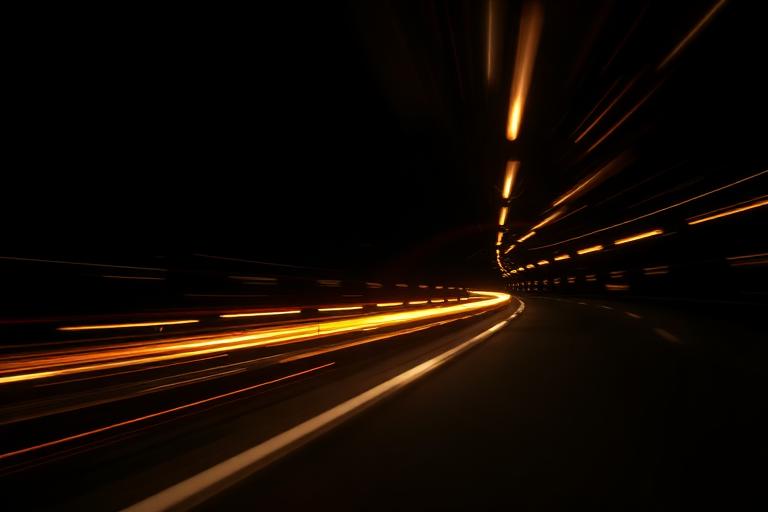 Golden light streaks suggesting ultra-fast rendering speed
