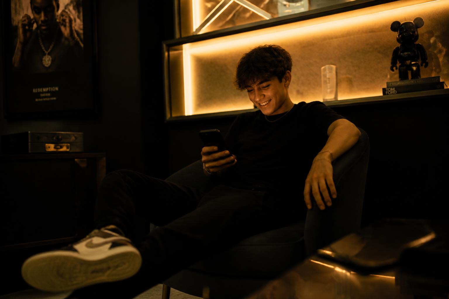 AI-generated photo of a teenager laughing at a group chat flex made with Lyvoriia